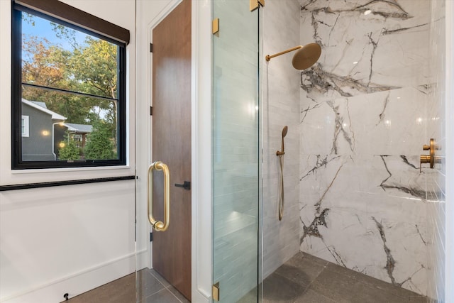 full bathroom featuring a marble finish shower