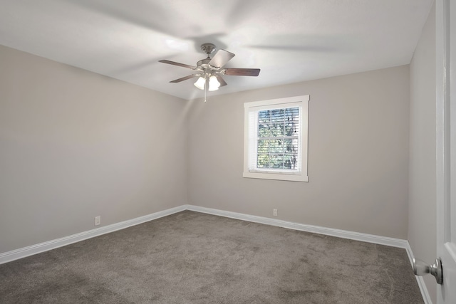 spare room with carpet and ceiling fan