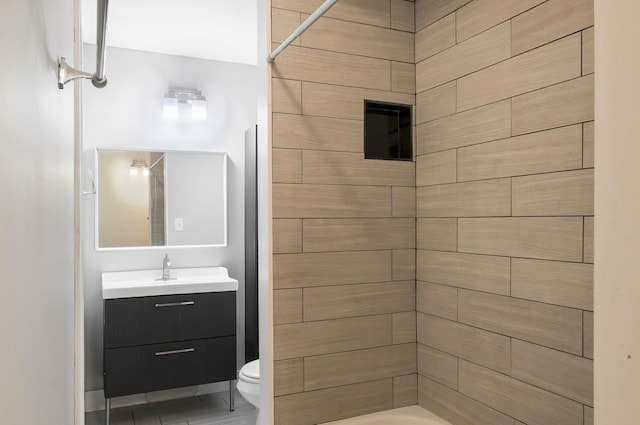 bathroom with vanity and toilet