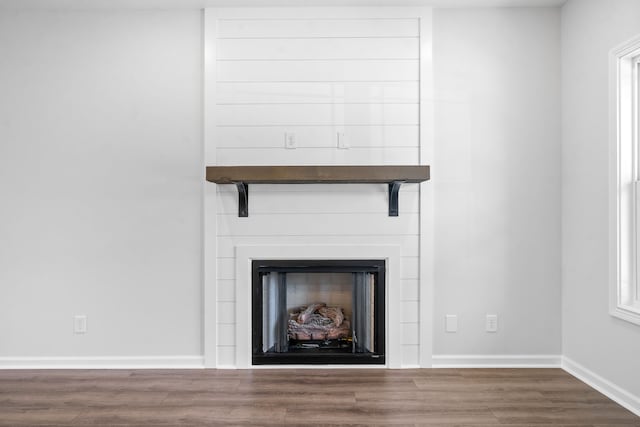 interior details featuring wood-type flooring