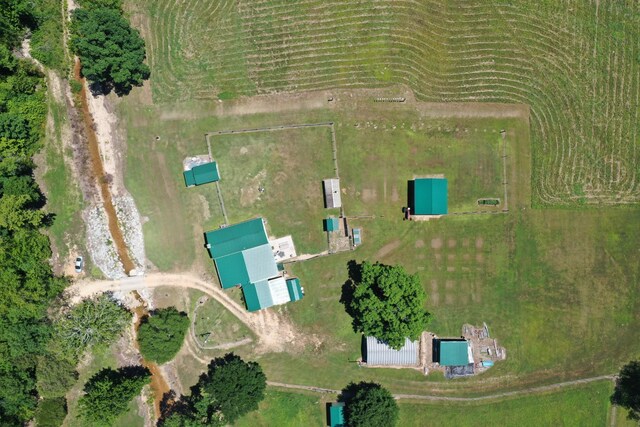 birds eye view of property featuring a rural view