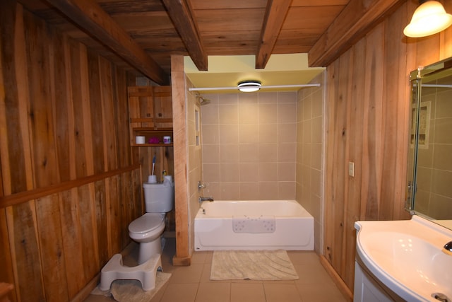 full bathroom with beamed ceiling, wood walls, and toilet