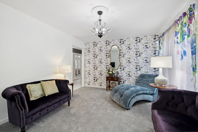 carpeted bedroom featuring a chandelier