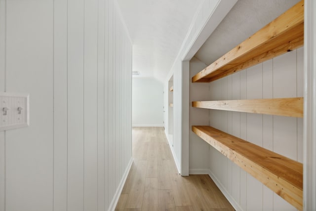 corridor featuring light hardwood / wood-style floors