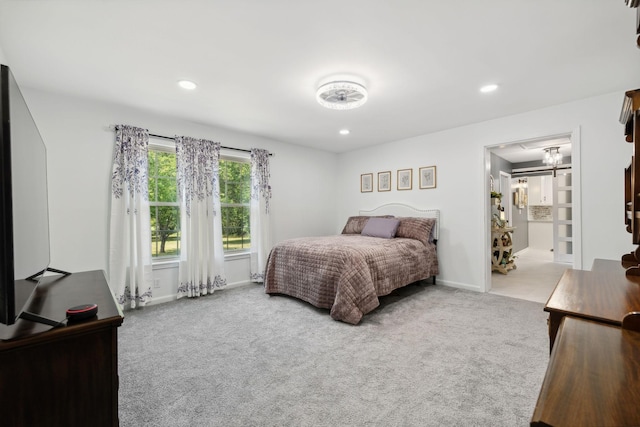 bedroom with recessed lighting, carpet flooring, and baseboards