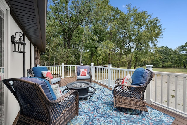 deck featuring a fire pit