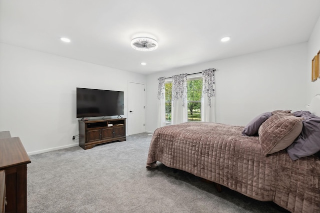 carpeted bedroom featuring access to outside, recessed lighting, and baseboards