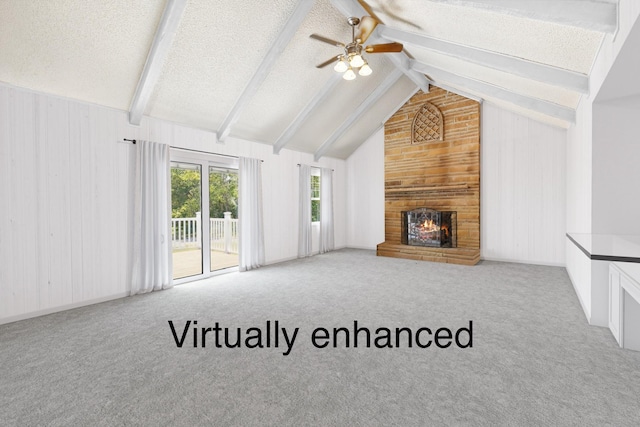 218 Oriole Dr, Lebanon, TN 37087 - unfurnished living room with wooden walls, a ceiling fan, carpet floors, a large fireplace, and a textured ceiling