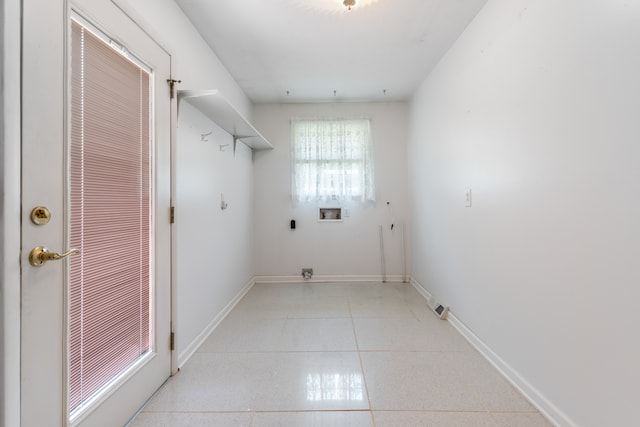 washroom with hookup for a washing machine and hookup for an electric dryer