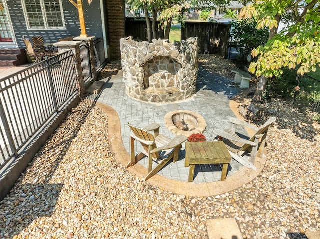 view of patio / terrace featuring an outdoor fire pit