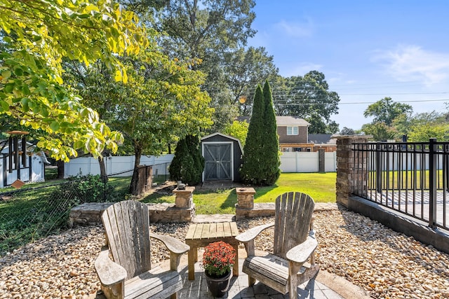 view of patio / terrace featuring a storage unit