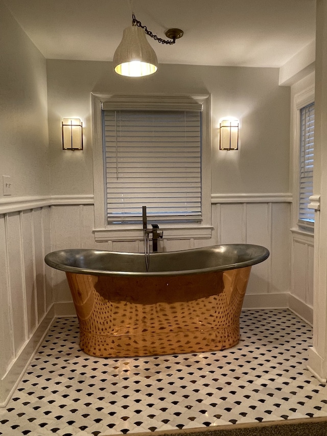 bathroom with a tub