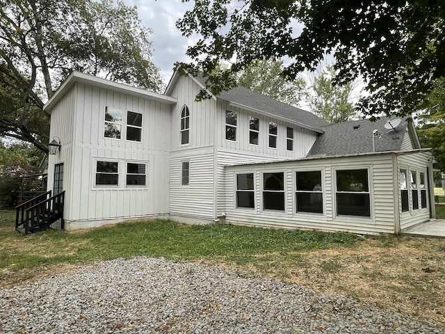 401 College St, Petersburg, TN 37144 - rear view of property featuring a shingled roof and board and batten siding