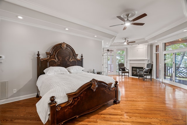 bedroom featuring ceiling fan, hardwood / wood-style flooring, access to outside, and crown molding