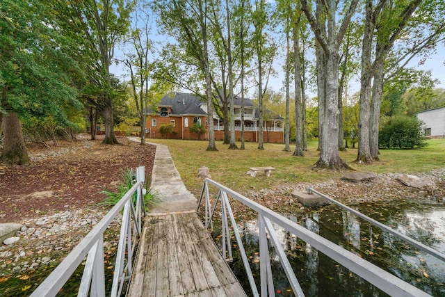 rear view of house with a water view