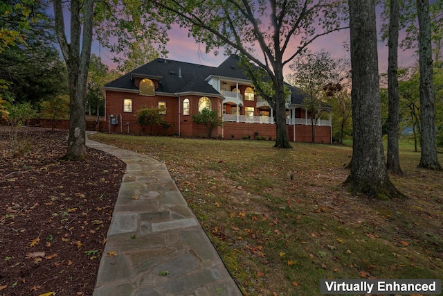 ranch-style house with a lawn