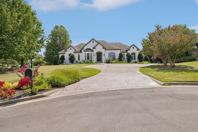 view of front facade with a front lawn