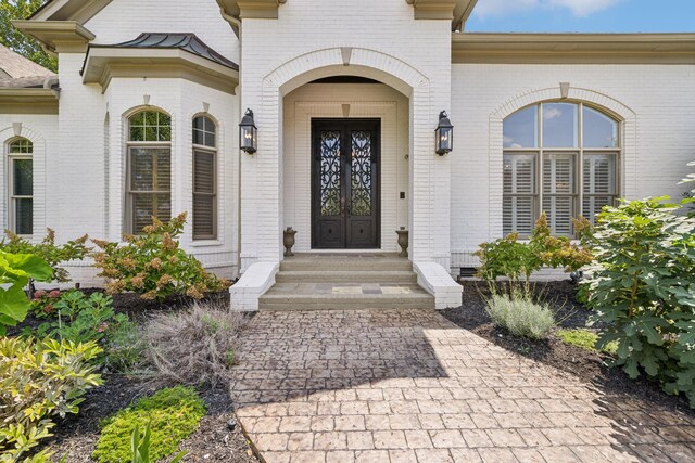 doorway to property featuring french doors