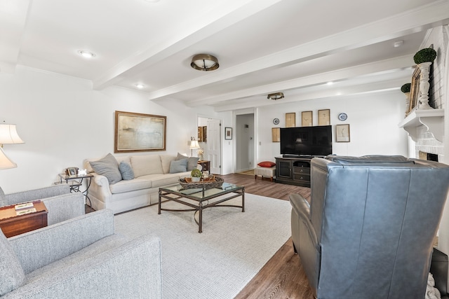 living room with wood-type flooring and beam ceiling