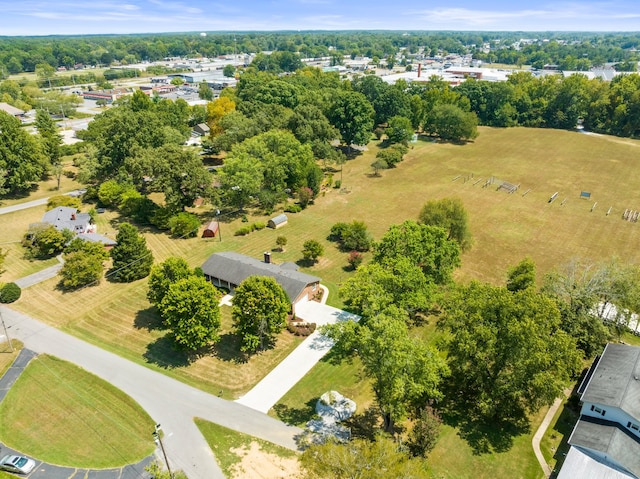 birds eye view of property featuring a rural view