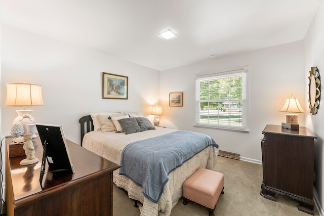 bedroom with light carpet