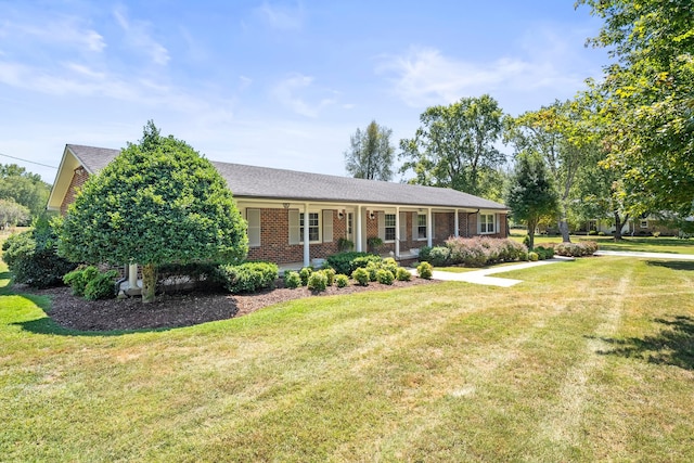 ranch-style home with a front yard