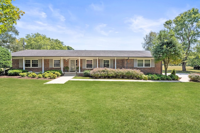 ranch-style house with a front yard