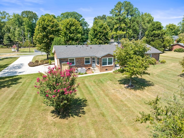 back of house with a yard