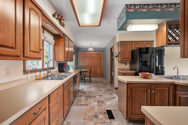 kitchen featuring black appliances and sink