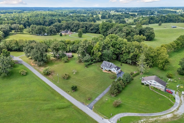 birds eye view of property with a rural view