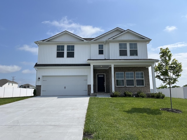 craftsman house featuring driveway, a garage, and brick siding