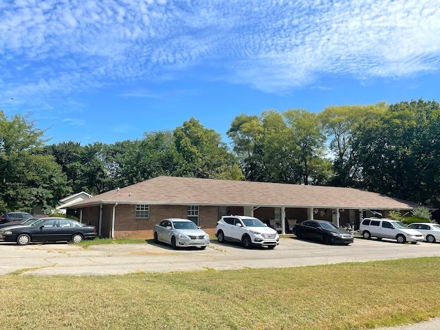 exterior space featuring a front lawn