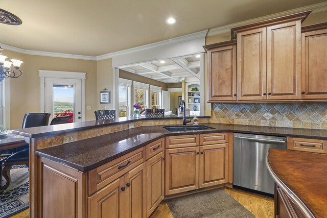 kitchen with coffered ceiling, dishwasher, crown molding, a chandelier, and light wood-type flooring