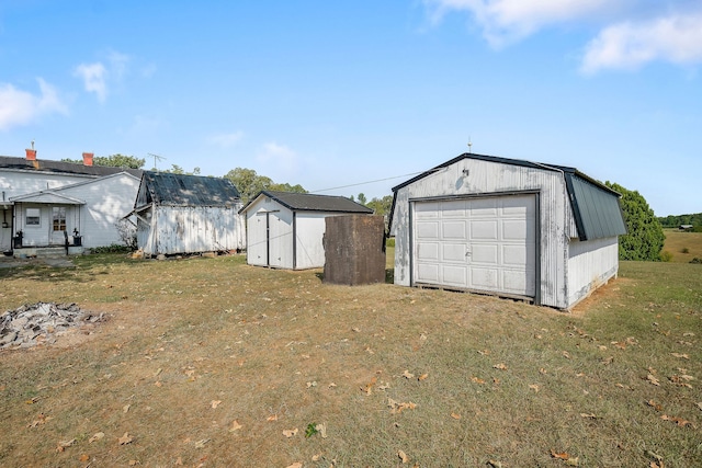 garage with a lawn