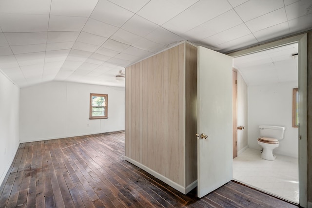 bonus room with dark hardwood / wood-style floors