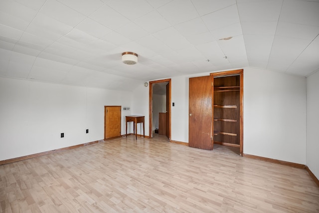 unfurnished bedroom featuring light wood-type flooring