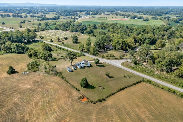 birds eye view of property featuring a rural view