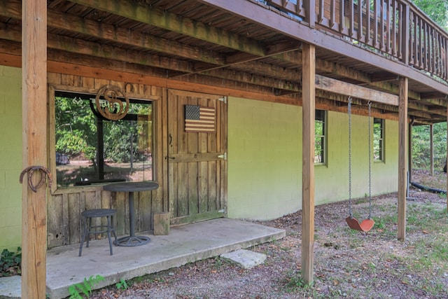 doorway to property with a deck