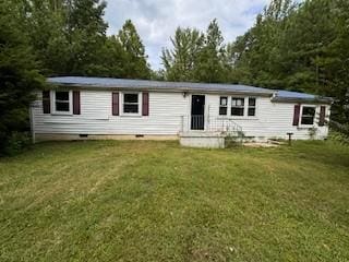 view of front of house with crawl space and a front lawn