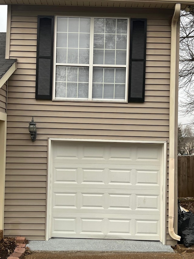 garage featuring fence