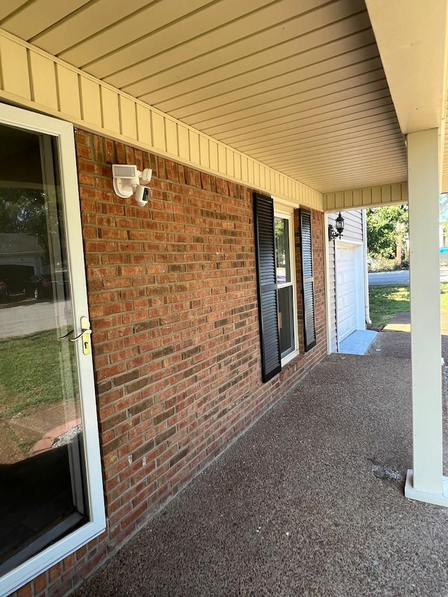 view of patio with a garage