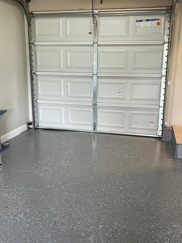 garage with baseboards