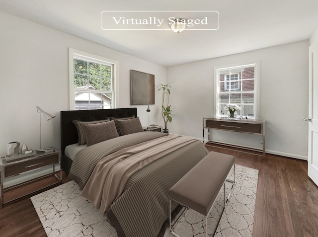 bedroom featuring dark hardwood / wood-style floors