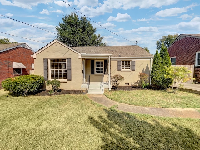 ranch-style house with a front yard