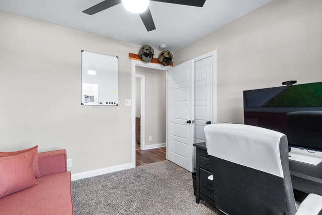 office space featuring ceiling fan and carpet floors