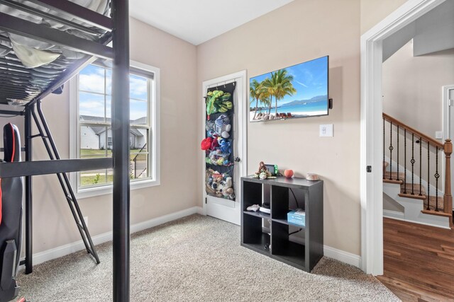 exercise area with hardwood / wood-style flooring and a wealth of natural light