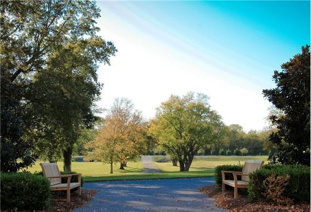 view of community featuring a lawn