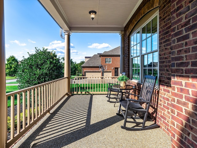 balcony featuring covered porch