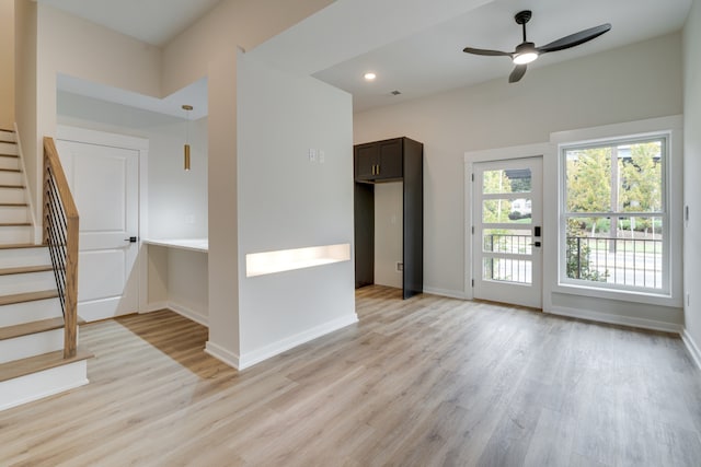 interior space featuring ceiling fan and light hardwood / wood-style flooring