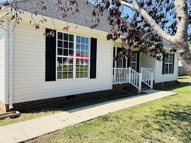 exterior space featuring a front yard